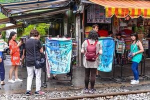 SHIFEN, TAIWAN -  OCT 10, 2017-The Shifen Old Street section of Pingxi District has become one of the famous tourist stops along this line for launching lantern. photo