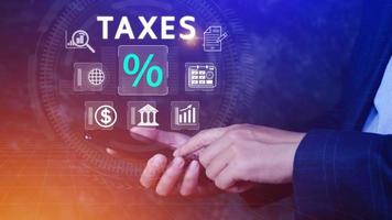 Business using smart phone to complete Individual income tax return form online for tax payment. Government, state taxes. Data analysis, paperwork, financial research, Calculation tax return. photo