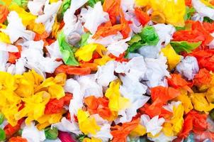 Pile candy and taffy sweets with colorful for background photo