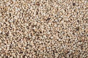 raw  and roasted coffee beans,green unroasted coffee beans,for background photo