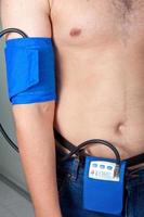 Holter Monitor on a male patient photo