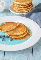 Pancakes with fresh blueberries photo