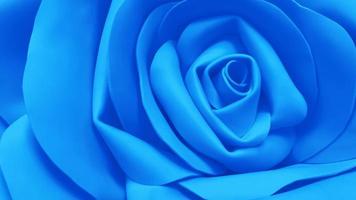 blue flower background of artificial foamiran rose photo