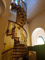 The spiral staircase at Siak Palace is very luxurious photo