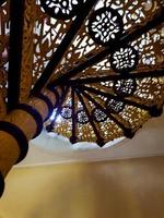 The spiral staircase at Siak Palace is very luxurious photo