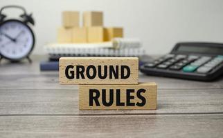 ground rules is shown on a conceptual photo using wooden blocks