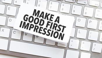 Text Make a good first impression written on paper sheet on a computer keyboard photo