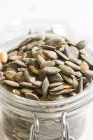 Unshelled pumpkin seed photo