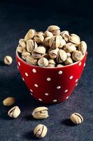 Pistachios in the cup photo