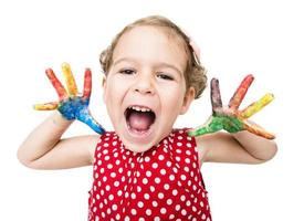 Positive child with colorful hands photo