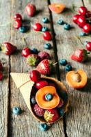 Fresh fruits in cone photo