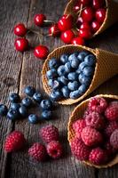 Fresh fruits in cone photo