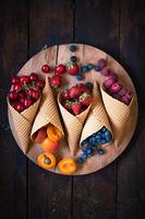 Fresh fruits in cone photo