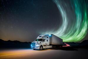 Freight transport truck on the road with beautiful starry sky and aurora borealis, photo