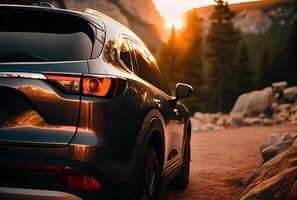 Electric suv cars parked in the view point with mountains in the background. photo