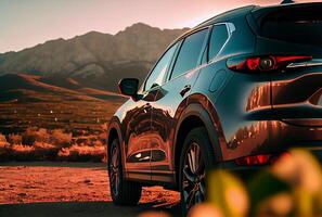 Electric suv cars parked in the view point with mountains in the background. photo