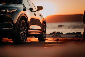 Electric suv cars parked in the coastal road with the sea in the background. photo