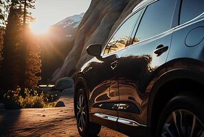 Electric suv cars parked in the view point with mountains in the background. photo