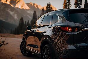 Electric suv cars parked in the view point with mountains in the background. photo