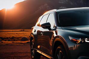 Electric suv cars parked in the view point with mountains in the background. photo