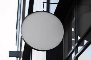 Blank white minimal circular shop signboard mockup. photo