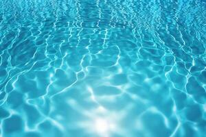 Pool water surface background with sunlight reflection. photo