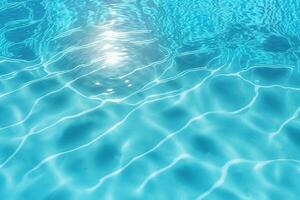 Pool water surface background with sunlight reflection. photo