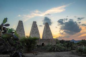 Mine Hacienda Santa Brigida furnaces and chimneys in Mineral de Pozos, Guanajuato, Mexico photo