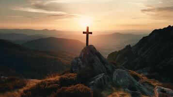 a wooden cross on the top of mountain . artwork photo