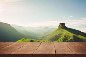 The old wooden table in front of mountain and sky with . photo