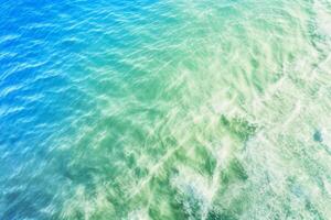 The crystal clear of sea near the shore with . photo