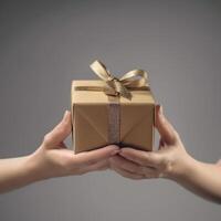 hands holding a gift box photo