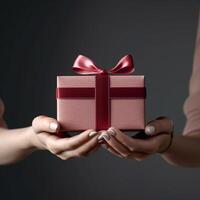 hands holding a gift box photo