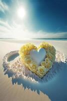 heart made out of yellow roses on a sandy beach. . photo