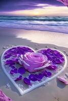 pink rose in the shape of a heart on a beach. . photo