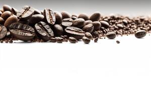 Roasted coffee beans on white background with copy space. photo