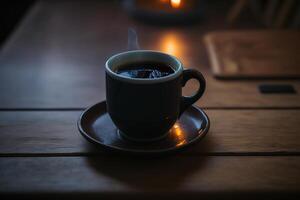 A cup of hot black coffee on a wooden table, in a vintage atmosphere. photo