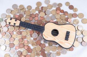 Coins and a guitar photo