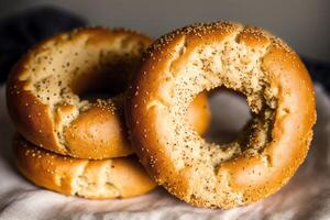 Freshly baked bread on a wooden board, close-up.Bagel photo