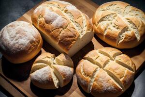 Freshly baked bread on a wooden board, close-up.Bagel photo