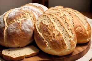 Freshly baked bread on a wooden board, close-up.Bagel photo