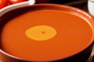 Pumpkin soup with cream and parsley. Creamy tomato soup. Chicken noodle soup. photo