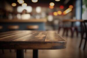 Wooden table in front of abstract blurred coffee shop background. photo