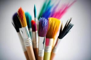 Colorful Paint Brushes with isolated white background and copy space. photo