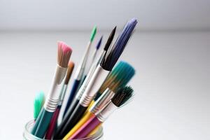 Colorful Paint Brushes with isolated white background and copy space. photo