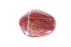 Macro mineral stone jasper on a white background photo