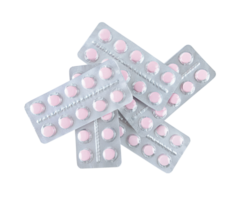 A bunch of pink tablets in blisters isolated on transparent background. png