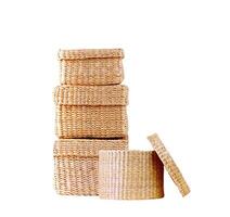 isolated round woven straw basket photo