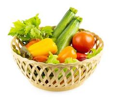 set of vegetable in basket isolated on white background. Basket filled with vegetables on white background. collection fresh vegetables in basket isolated on white background with clipping path photo