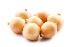 group of fresh yellow onion isolated on white food background photo